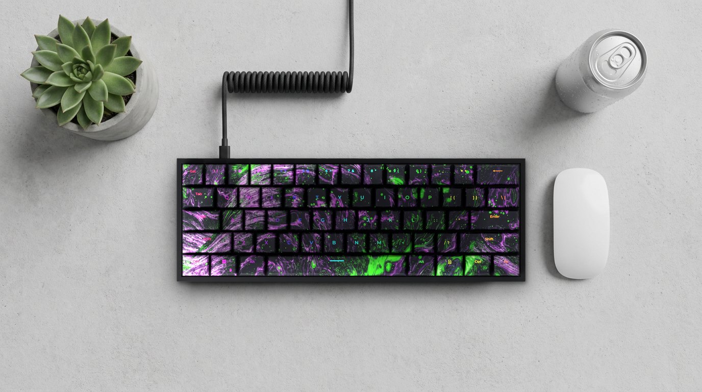 Green Lava T60 Pro keyboard on a concrete desk